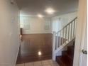 Inviting living room with gleaming floors, staircase, and plenty of natural light at 523 Cabis Bay St, Las Vegas, NV 89178