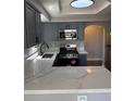 Updated kitchen with stainless steel appliances, ample counter space, and modern fixtures at 541 Indian Bluff St # 201, Las Vegas, NV 89145