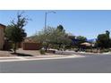 Neighborhood park offering a playground under a shade structure and landscaped areas at 711 Golden Sedum Dr, Henderson, NV 89011
