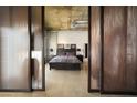 Cozy bedroom featuring modern sliding doors and access to the main living area at 900 Las Vegas Blvd # 715, Las Vegas, NV 89101