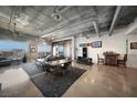Contemporary open floor plan with polished concrete floors and floor to ceiling windows boasting stunning city views at 900 Las Vegas Blvd # 715, Las Vegas, NV 89101