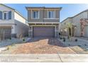 Charming two-story home with a brick driveway and convenient two-car garage at 10328 Apefly St, Las Vegas, NV 89141