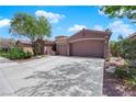Charming single-story home featuring a neutral color scheme and a spacious two-car garage at 11244 Gammila Dr, Las Vegas, NV 89141