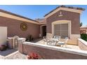 Inviting front patio featuring an outdoor seating area and decorative accents for relaxing at 2114 High Mesa Dr, Henderson, NV 89012