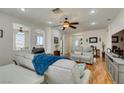 Bright living room with hardwood floors, recessed lighting, and comfortable seating at 2114 High Mesa Dr, Henderson, NV 89012