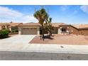 Lovely one-story home with a terracotta tiled roof and a two-car garage at 2913 Hawksdale Dr, Las Vegas, NV 89134