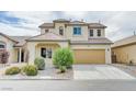 Charming two-story home features desert landscaping and a two-car garage at 3743 Prairie Orchid Ave, North Las Vegas, NV 89081