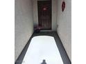 A cozy, covered entryway welcomes visitors with a warm-toned door, seasonal decor, and a 'Welcome' mat at 3862 E Summit Ave, Pahrump, NV 89061