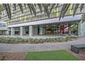 Hotel entrance featuring modern architecture, landscaping, and covered entryway, offering a luxurious arrival experience at 4381 W Flamingo Rd # 1101, Las Vegas, NV 89103