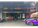Luxury hotel valet and check-in area featuring modern signage, multiple vehicle lanes, and convenient guest services at 4381 W Flamingo Rd # 1101, Las Vegas, NV 89103