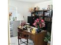 Well-lit home office with lots of storage and a comfortable chair at 5415 W Harmon Ave # 2094, Las Vegas, NV 89103