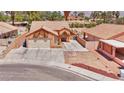 Charming single-Gathering home features a large driveway, two-car garage, and well-maintained landscaping at 5536 Cleary Ct, Las Vegas, NV 89108