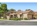 Well-maintained home with a two-car garage and neat landscaping at 7296 Mission Hills Dr, Las Vegas, NV 89113