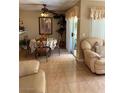 Charming dining area with tile flooring, ceiling fan, and sliding door leading to outdoor space at 7950 W Flamingo Rd # 2074, Las Vegas, NV 89147