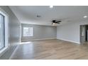 Bright and airy living room with contemporary flooring, recessed lighting, and large windows at 1013 Cunningham Dr, Las Vegas, NV 89106
