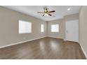 Bright and airy living room featuring hardwood floors and neutral walls at 125 Sharp Edge Ave, North Las Vegas, NV 89031