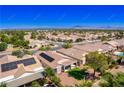Aerial view showing neighborhood, solar panels, and a well-kept backyard at 2185 High Mesa Dr, Henderson, NV 89012