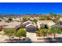 Beautiful aerial view of a home with a tile roof in a well-maintained neighborhood at 2185 High Mesa Dr, Henderson, NV 89012