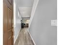 Welcoming entryway with wood floors and stairs leading to the upper level at 3002 Coveri Ct, Las Vegas, NV 89141