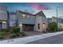 Charming two-story home with a two-car garage and well-maintained landscaping at 3206 Fountaintree Ave, Henderson, NV 89044