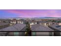Stunning neighborhood view of city lights and mountain range at 390 Coastal Redwood St, Las Vegas, NV 89138