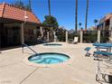 Community hot tubs are surrounded by lush landscaping, perfect for relaxation and recreation at 4121 Gannet Cir # 414, Las Vegas, NV 89103