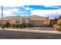 Attractive single-story home featuring a low-maintenance yard and a two-car garage at 7525 Campbell Ranch Ave, Las Vegas, NV 89179