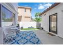 Cozy outdoor patio with comfortable seating and stylish decor, perfect for relaxation at 8268 Nelson Ridge Ln, Las Vegas, NV 89178