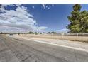 White fence and brick column surround this horse property at 8440 La Cienega St, Las Vegas, NV 89123