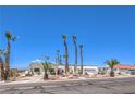 Charming single-story home with desert landscaping and an arched gated front entry at 1157 Morning Sun Way, Las Vegas, NV 89110