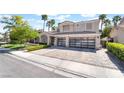 Beautiful two-story home with well-maintained landscaping, a three-car garage, and a spacious driveway at 188 Carthage St, Henderson, NV 89074
