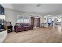 Spacious living room featuring hardwood floors and lots of natural light at 3018 Burnham Ave, Las Vegas, NV 89169