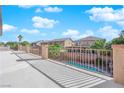 Spacious balcony with view of neighborhood, pool and beautiful desert landscaping at 4063 Lower Saxon Ave, North Las Vegas, NV 89085
