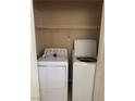 Convenient laundry area with a washer and dryer, designed for efficient chore management at 5161 Briar Meadow Way, Las Vegas, NV 89118