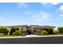 Beautiful modern home showcasing sleek lines, stone accents and well-manicured lawn at 641 Majestic Rim Dr, Henderson, NV 89012