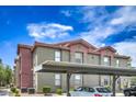 Exterior image featuring parking and lush landscaping, offering a glimpse of the building's layout at 8000 Badura Ave # 1168, Las Vegas, NV 89113