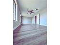 Bright bedroom with updated flooring, ceiling fan, and natural light at 1967 N Moapa Valley Blvd, Logandale, NV 89021