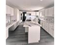 Updated kitchen featuring sleek countertops, modern appliances, and ample cabinet space at 1967 N Moapa Valley Blvd, Logandale, NV 89021