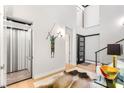 Bright foyer features an elevator, artistic decor, and sleek design at 358 Solitude Peak Ln, Henderson, NV 89012