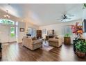 Bright living room with hardwood floors, high ceilings and a neutral color palette at 3629 Ferrell St, North Las Vegas, NV 89032