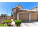Delightful two-story home with an attached two-car garage, private entry, and tidy front yard at 7553 Durham Hall Ave # 201, Las Vegas, NV 89130