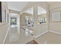 Spacious hallway showcasing elegant archways and modern design at 7986 Merlewood Ave, Las Vegas, NV 89117