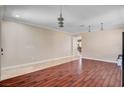 Spacious living room featuring both wood and tile flooring at 2117 Mountain Rail Dr, North Las Vegas, NV 89084