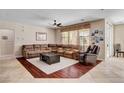Comfortable living room with large sofa and neutral color palette at 2117 Mountain Rail Dr, North Las Vegas, NV 89084