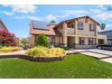 Well-maintained two-story house with an immaculate lawn and landscape at 4356 Sabadell St, Las Vegas, NV 89121