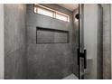 Modern bathroom with stylish tile, sleek fixtures, and a glass-enclosed shower for a spa-like experience at 4669 Winfield Dr, Las Vegas, NV 89147