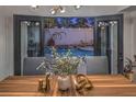 View from dining area to the private backyard oasis with a sparkling pool at 6 Megan Dr, Henderson, NV 89074