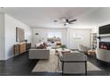 Bright and airy living room with fireplace, creating a cozy and inviting atmosphere at 934 Lewis Ct, Henderson, NV 89015