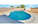 Enjoy a refreshing swim in this backyard pool, perfect for hot summer days at 934 Lewis Ct, Henderson, NV 89015