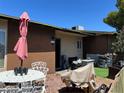 Charming front entry with lovely outdoor seating, desert landscaping, and a welcoming, relaxed ambiance at 111 E Van Wagenen St, Henderson, NV 89015